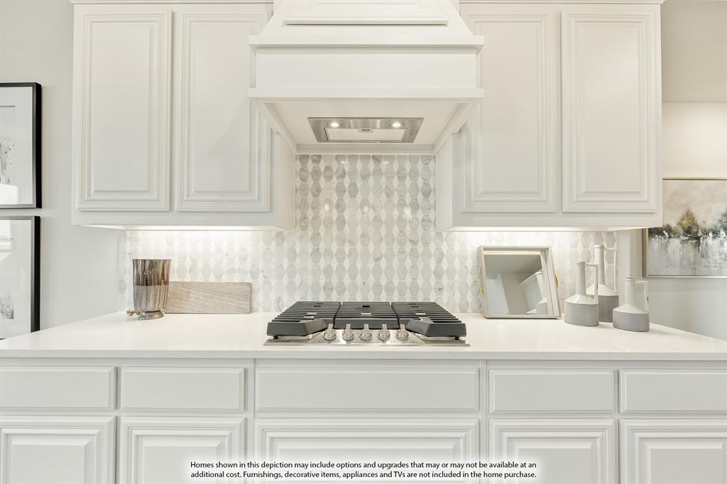 5230 Rutherford Drive Midlothian, TX 76065 - Photo 12 of 35 a kitchen with a stove and cabinets