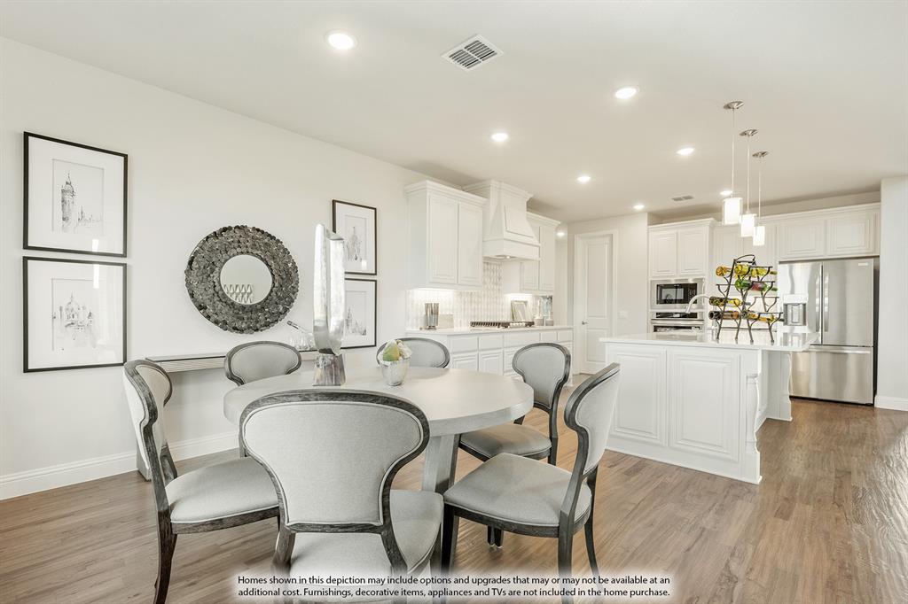 5230 Rutherford Drive Midlothian, TX 76065 - Photo 14 of 35 a view of a dining room with furniture and wooden floor