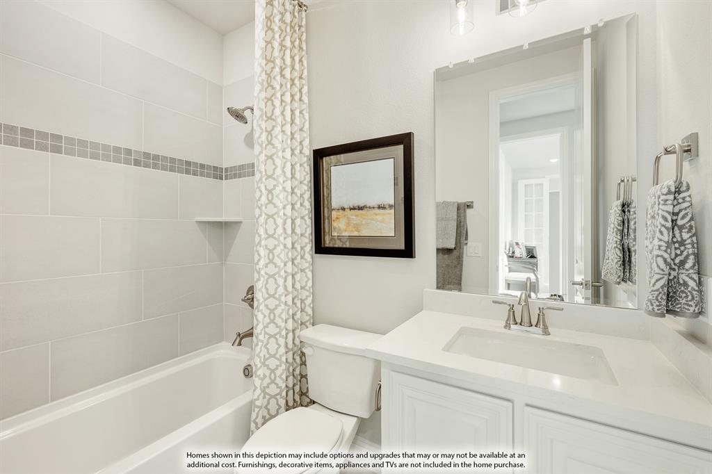 5230 Rutherford Drive Midlothian, TX 76065 - Photo 22 of 35 a bathroom with a sink a toilet and shower