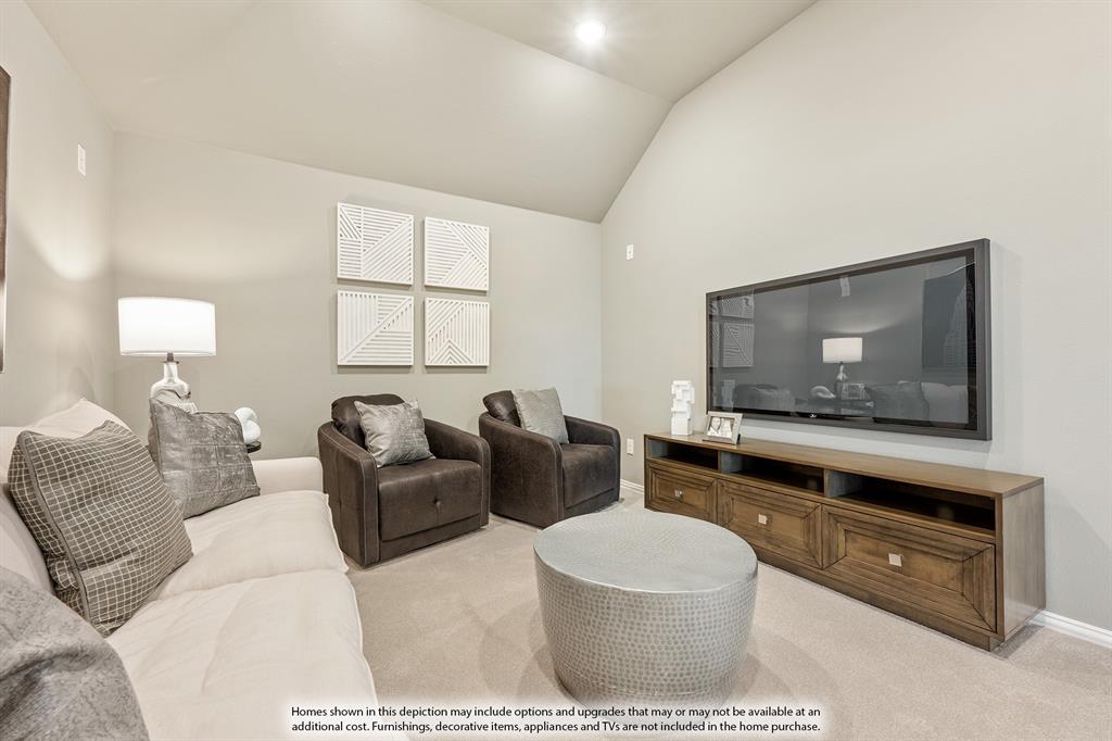 5230 Rutherford Drive Midlothian, TX 76065 - Photo 29 of 35 a living room with furniture a flat screen tv and a floor to ceiling window