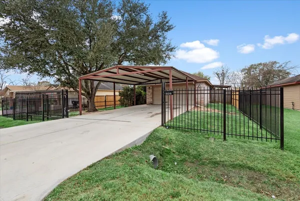 a view of a garden with a slide