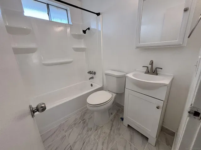 a kitchen with stainless steel appliances granite countertop a sink counter space and cabinets