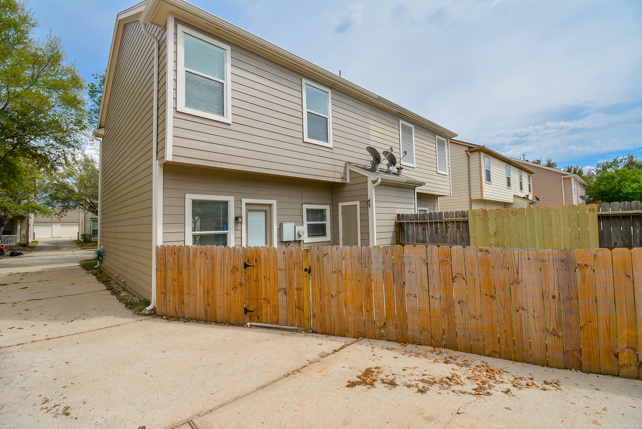 29725 Sullivan Oaks Drive Spring, TX 77386 - Photo 30 of 32 a view of a house with a wooden fence
