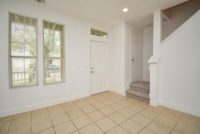 a view of an empty room and window