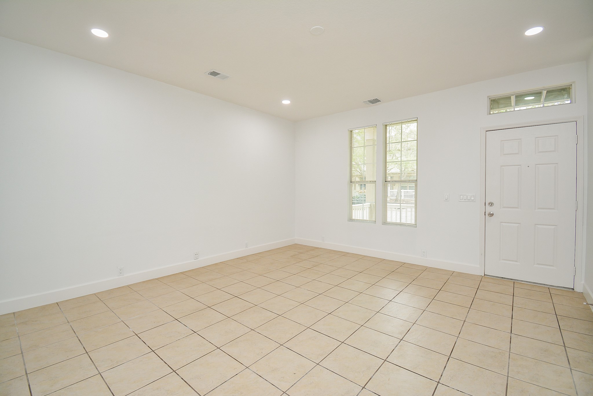 29725 Sullivan Oaks Drive Spring, TX 77386 - Photo 5 of 32 an empty room with windows