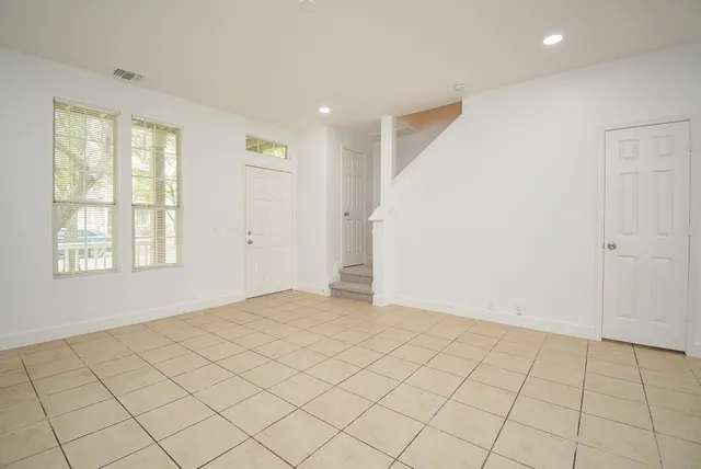 an empty room with windows