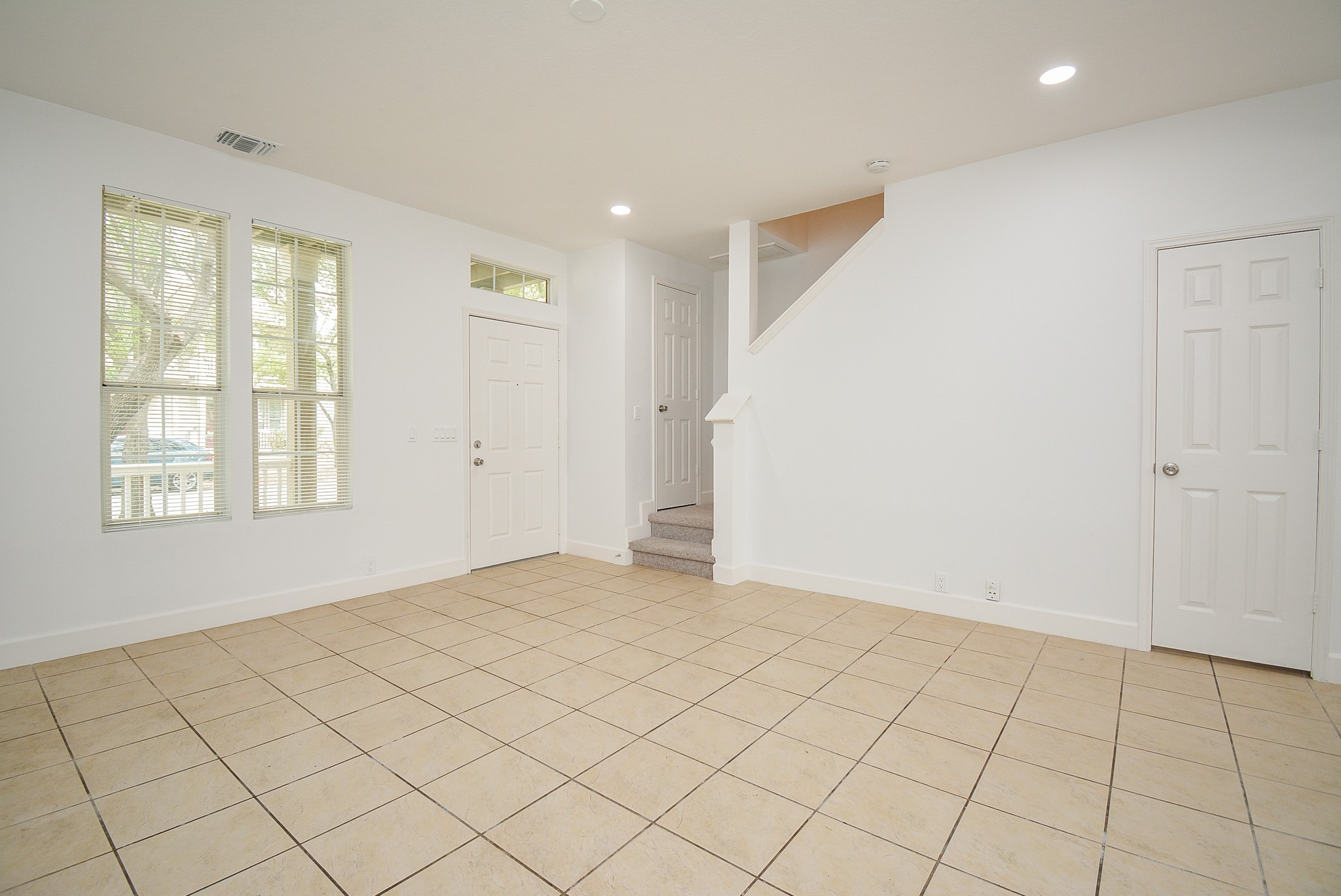 29725 Sullivan Oaks Drive Spring, TX 77386 - Photo 6 of 32 an empty room with windows