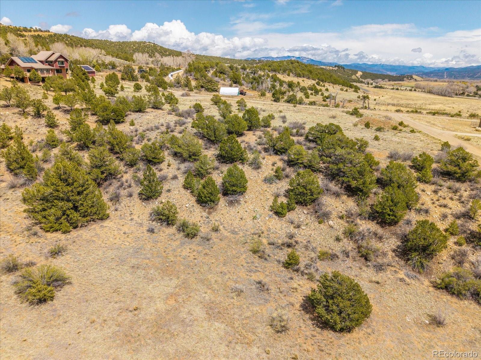 8209 Rocky Mountain Road Salida, CO 81201 - Photo 23 of 27 a view of beach and mountain