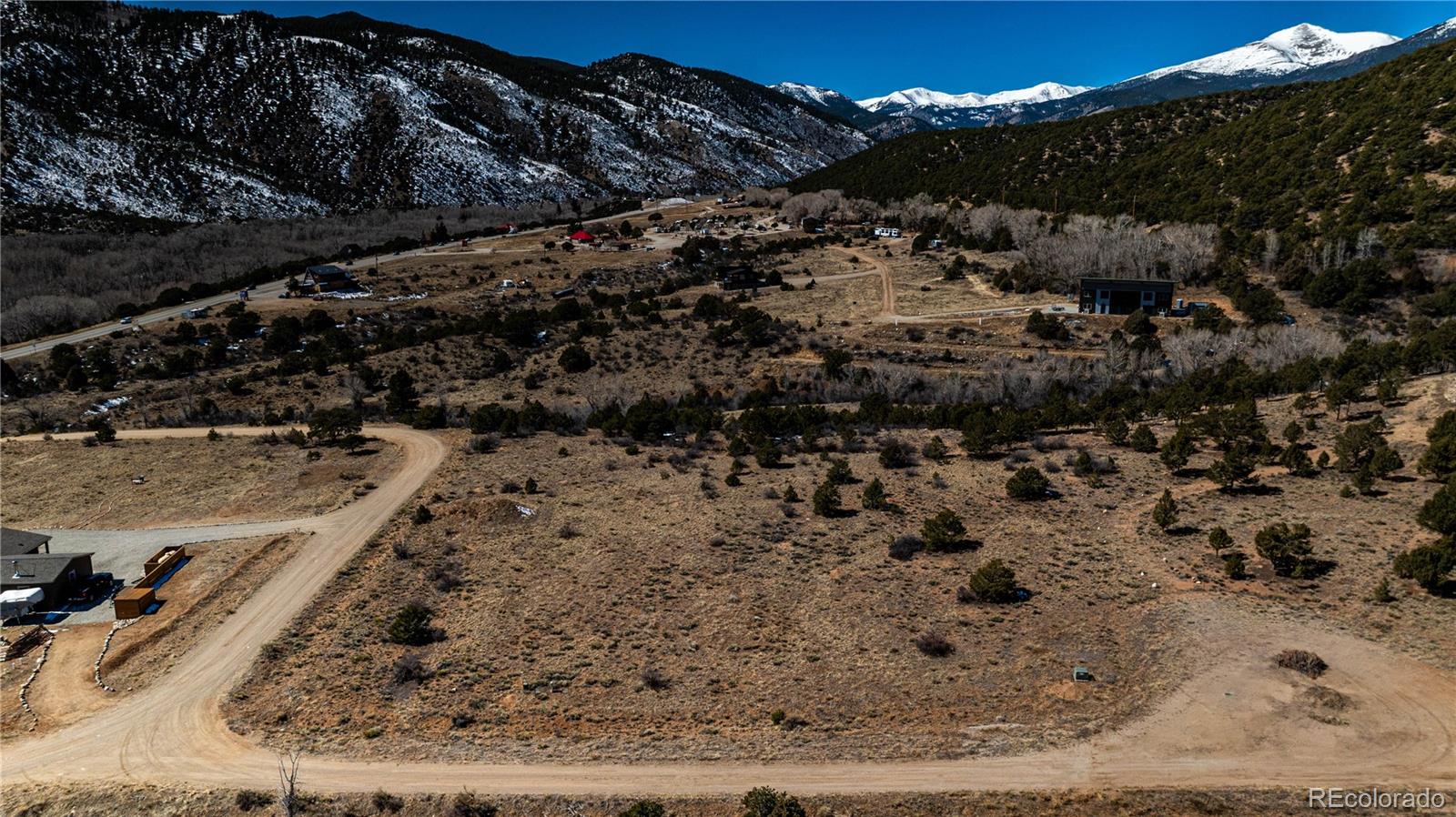 8209 Rocky Mountain Road Salida, CO 81201 - Photo 4 of 27 a view of a backyard of a house