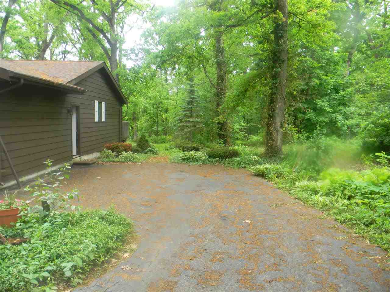 2150 Lake Summerset Road Davis, IL 61019 - Photo 2 of 18 a backyard of a house with lots of green space