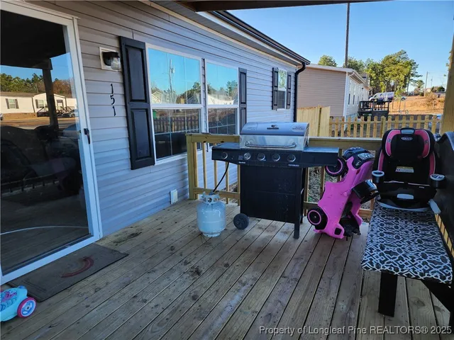a outdoor space with lots of potted plants
