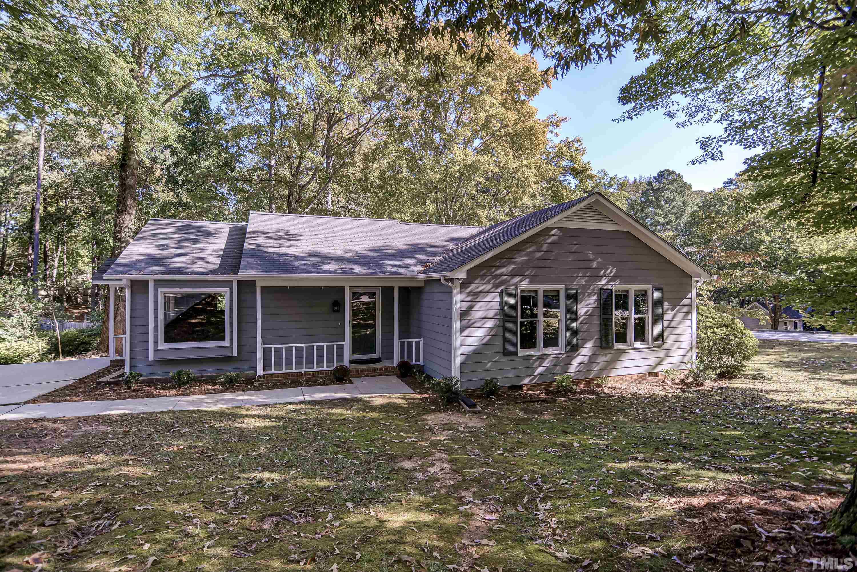 7400 Old Hundred Road Raleigh, NC 27613 - Photo 1 of 17 a view of a house with a yard