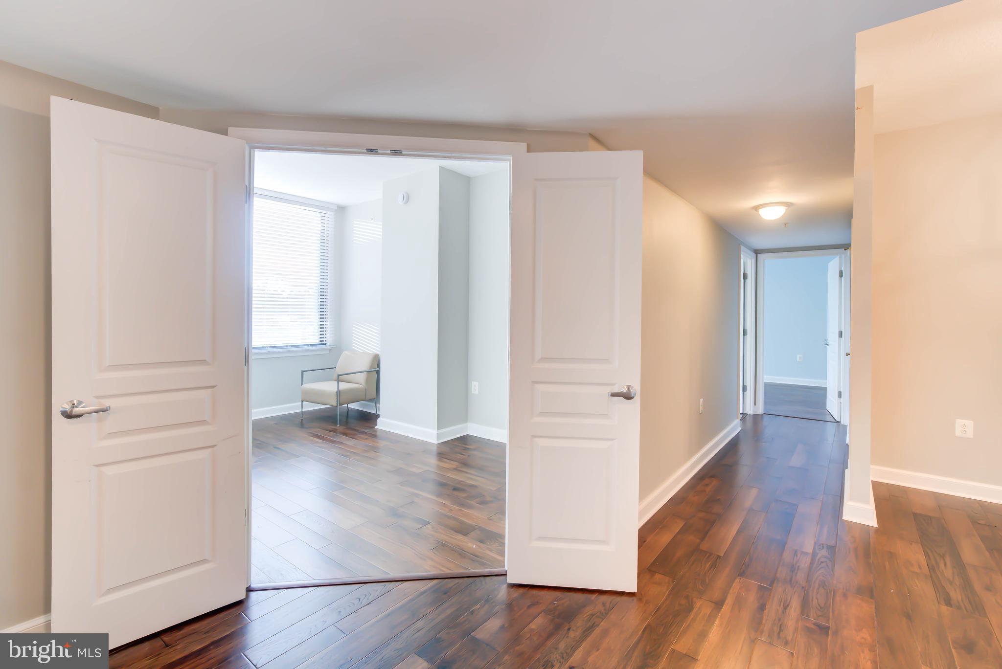2451 Midtown Avenue, Unit 1327 Alexandria, VA 22303 - Photo 11 of 32 a view of a room with wooden floor
