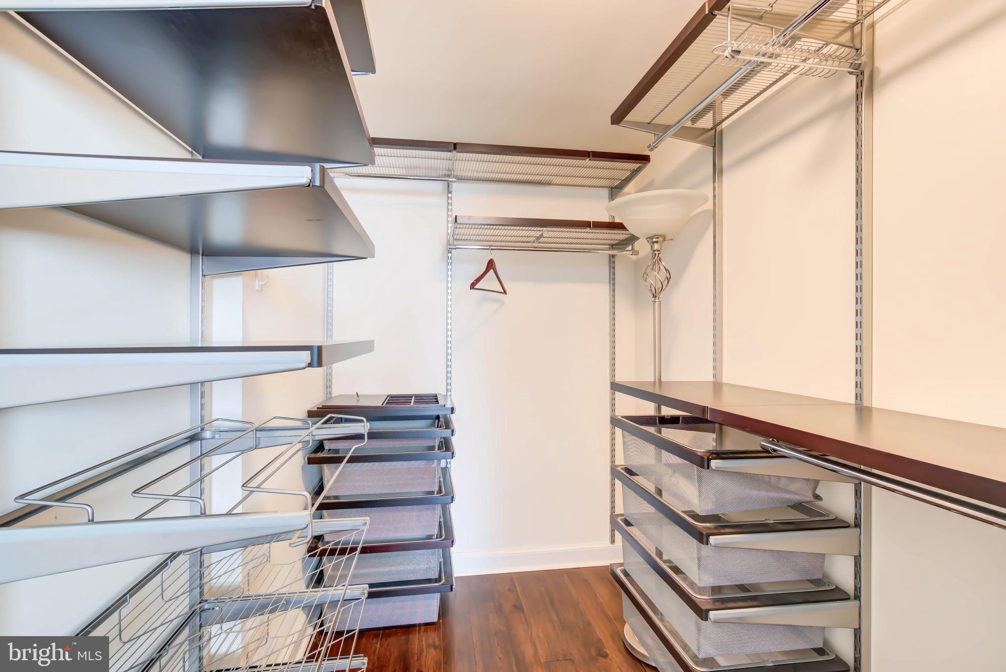 2451 Midtown Avenue, Unit 1327 Alexandria, VA 22303 - Photo 18 of 32 a view of a hallway with wooden floor and staircase