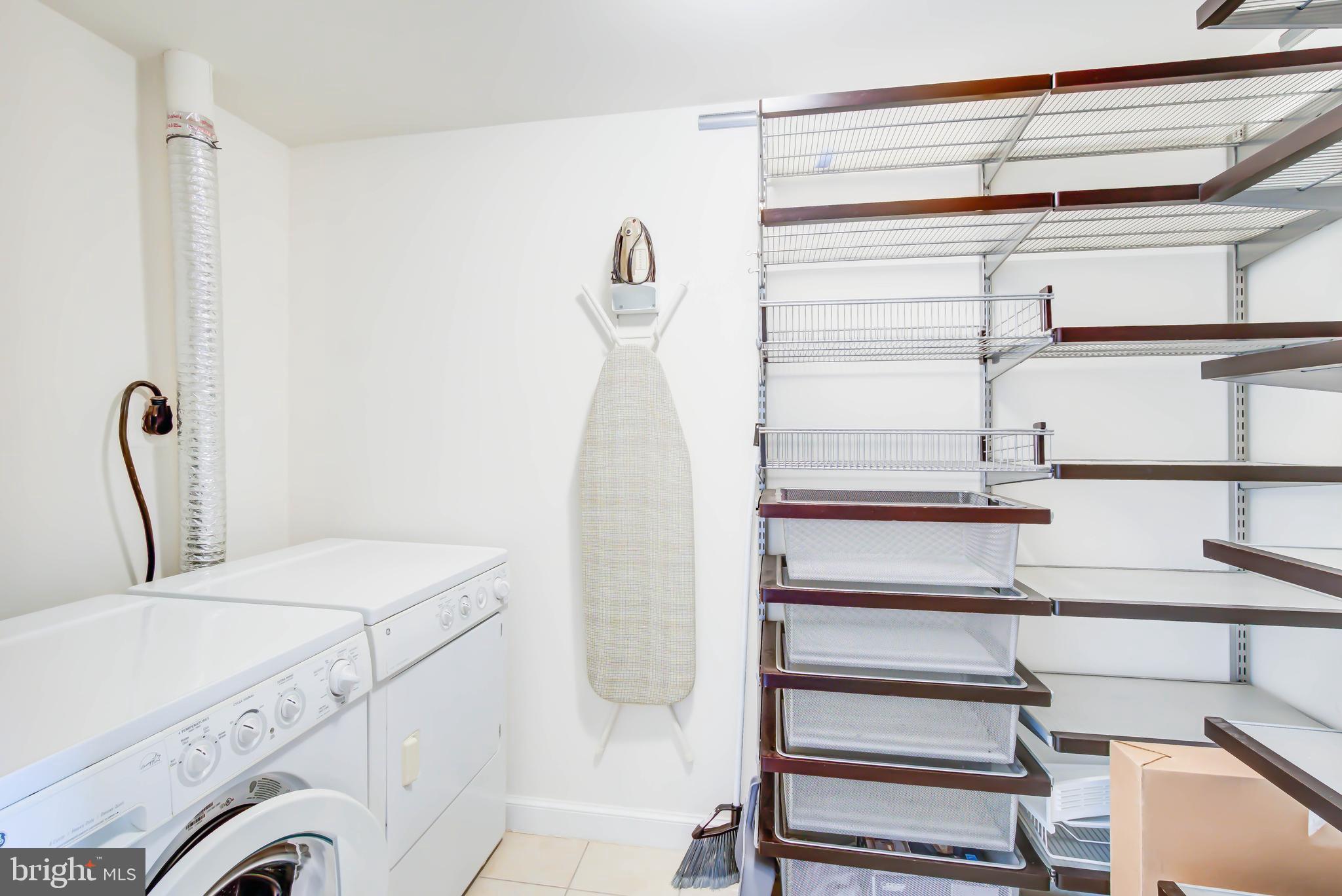 2451 Midtown Avenue, Unit 1327 Alexandria, VA 22303 - Photo 26 of 32 a bathroom with a sink and a vanity