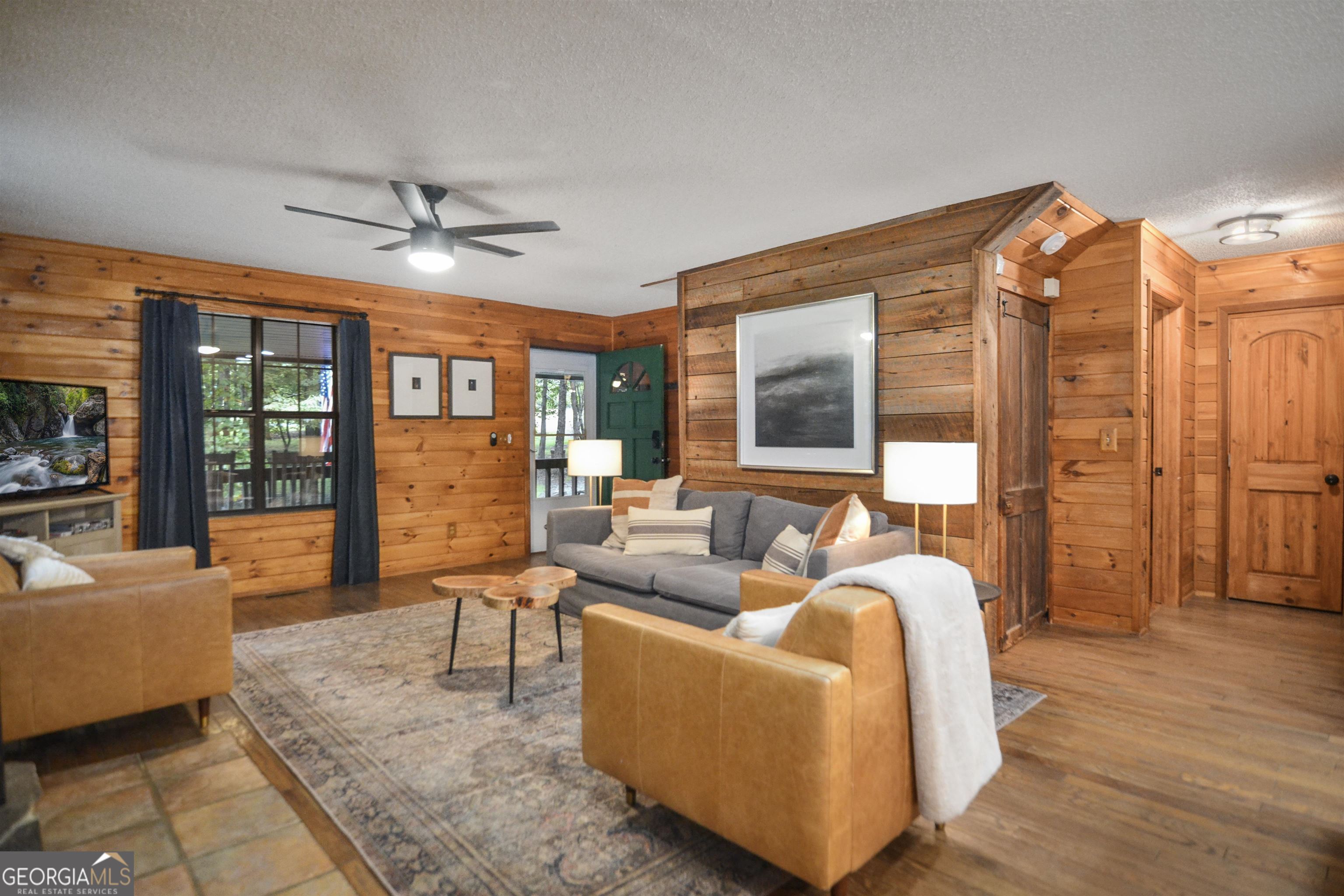 161 Old Dial Road Morganton, GA 30560 - Photo 11 of 40 a living room with furniture and large windows