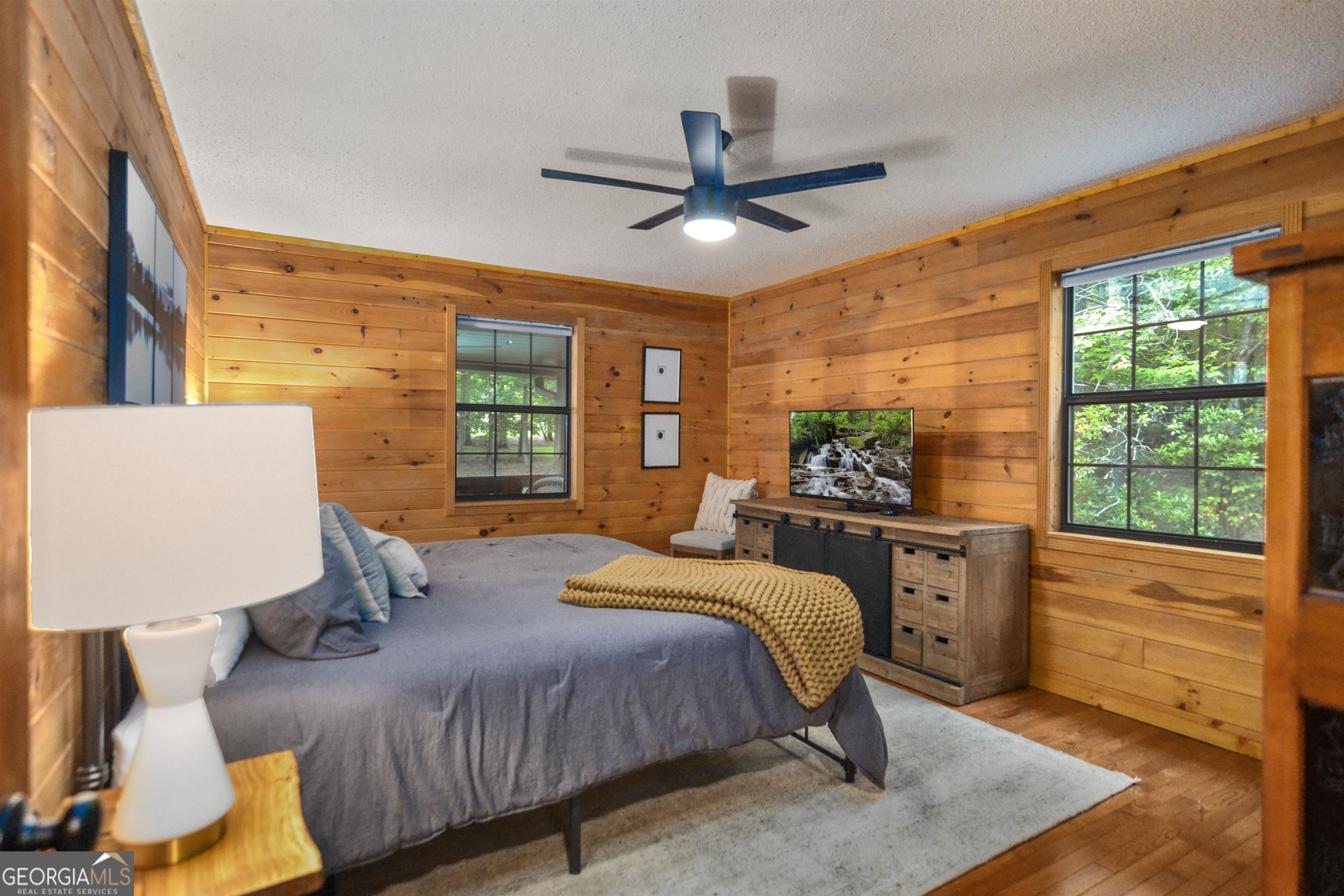 161 Old Dial Road Morganton, GA 30560 - Photo 20 of 40 a bedroom with a large bed and a window