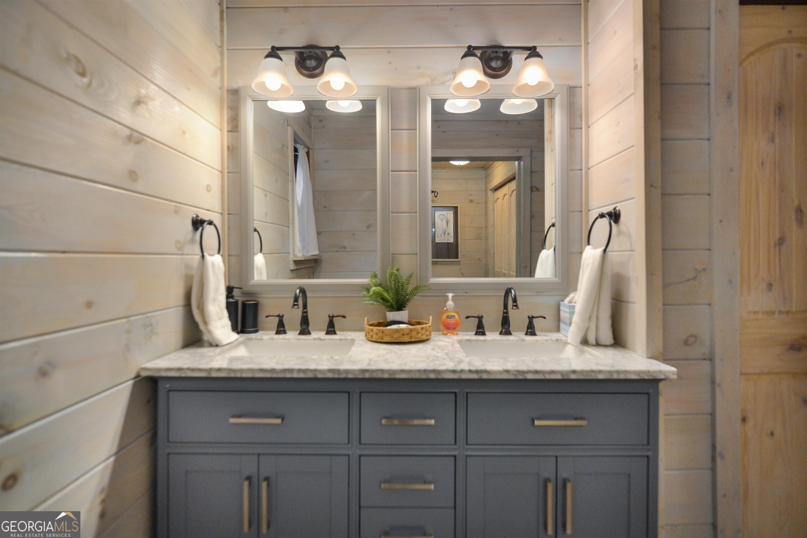 161 Old Dial Road Morganton, GA 30560 - Photo 24 of 40 a bathroom with a sink and a mirror