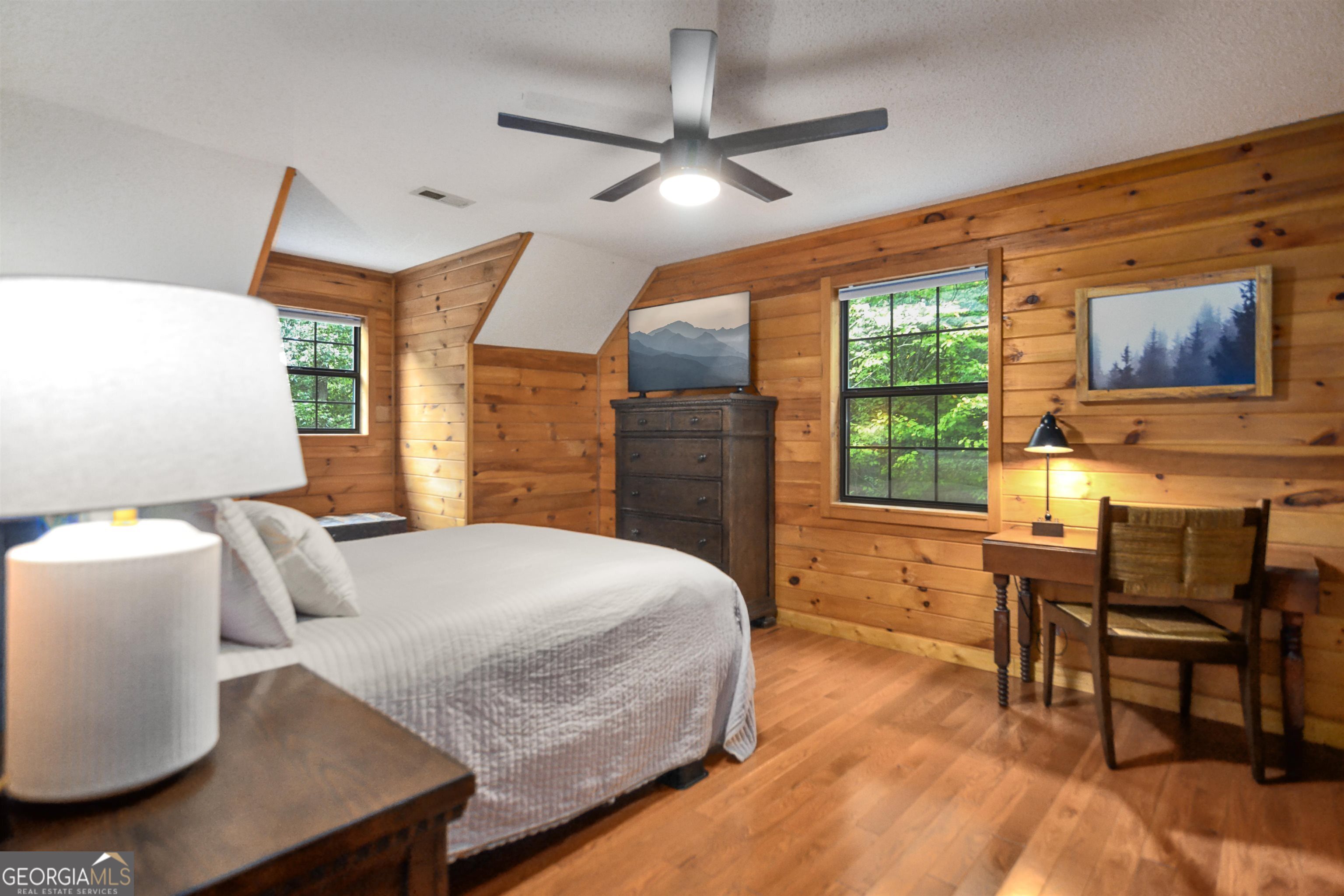 161 Old Dial Road Morganton, GA 30560 - Photo 26 of 40 a bedroom with a bed and wooden floor