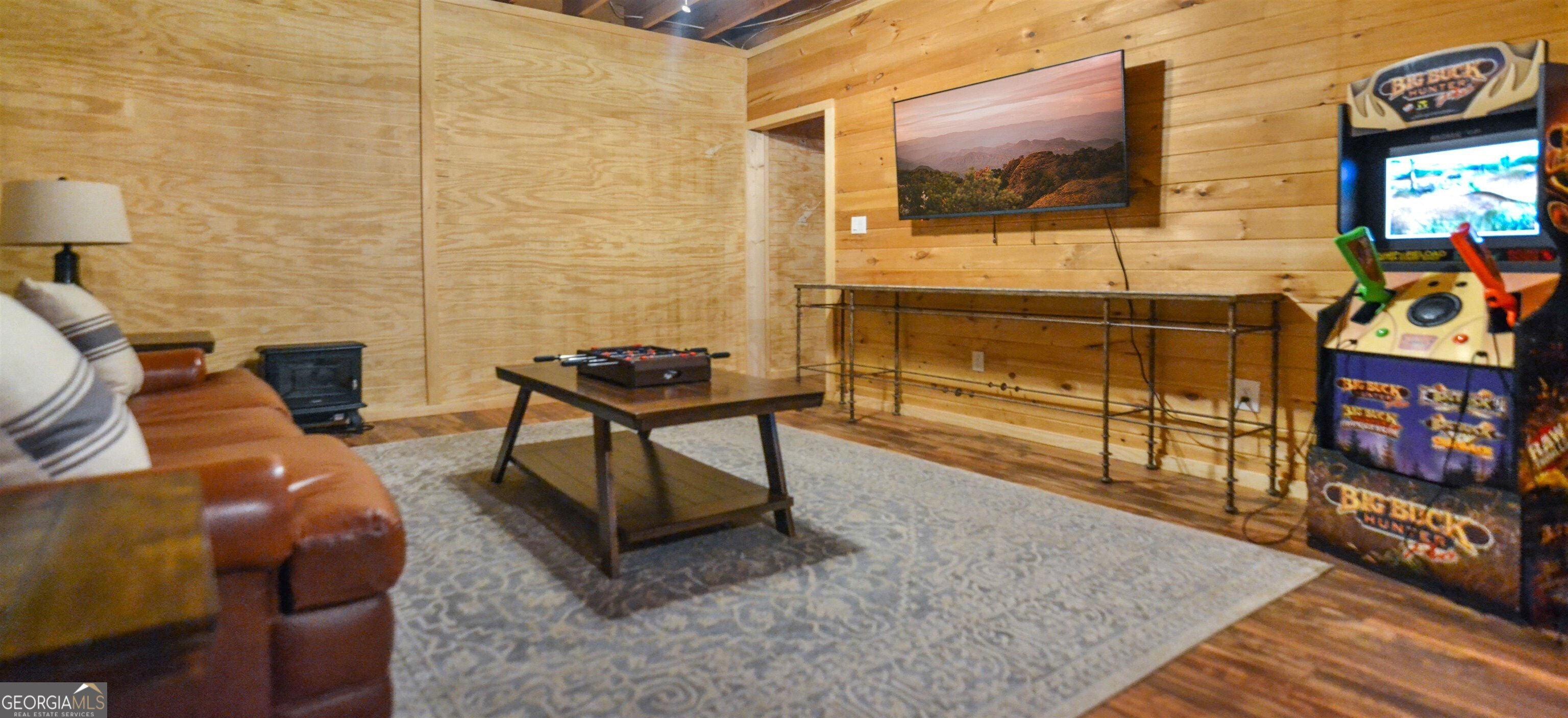 161 Old Dial Road Morganton, GA 30560 - Photo 33 of 40 a living room with furniture and a flat screen tv