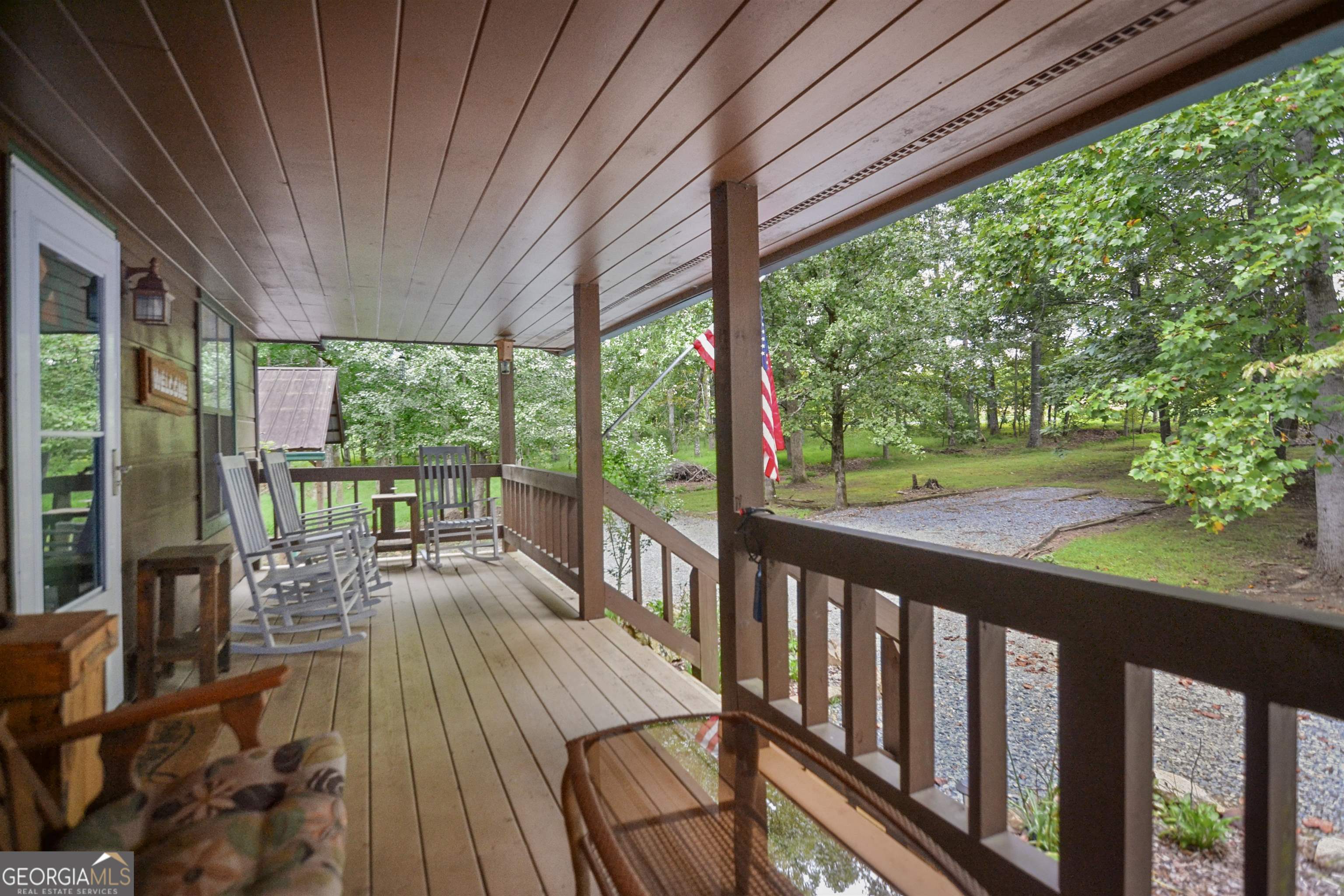 161 Old Dial Road Morganton, GA 30560 - Photo 9 of 40 a view of balcony with wooden floor and outdoor seating