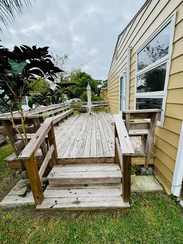 a bedroom with bed and window
