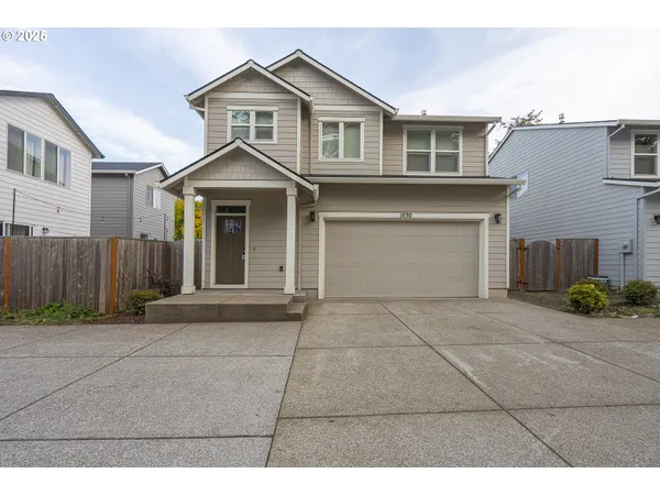 a front view of a house with yard