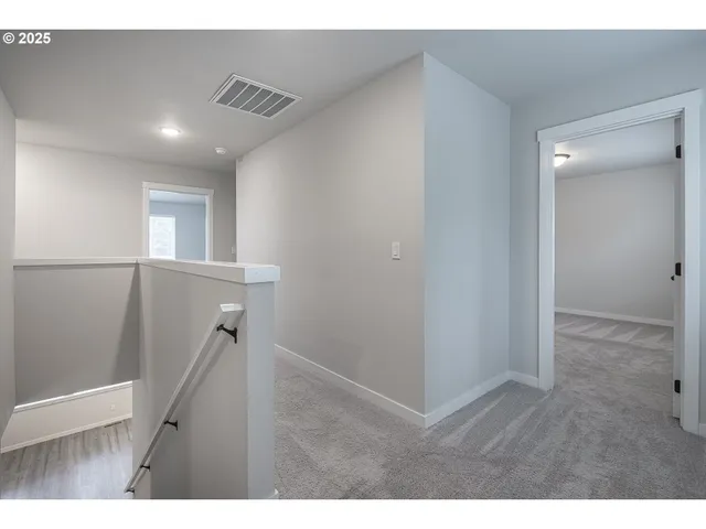 a view of entryway with stairs