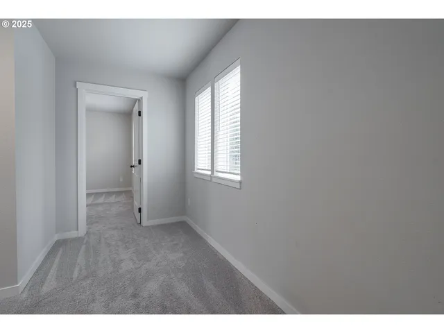 a view of an empty room with window