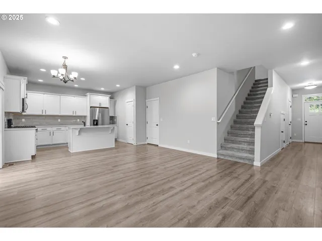 a view of kitchen with wooden floor