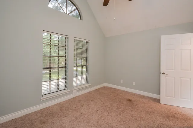 an empty room with windows