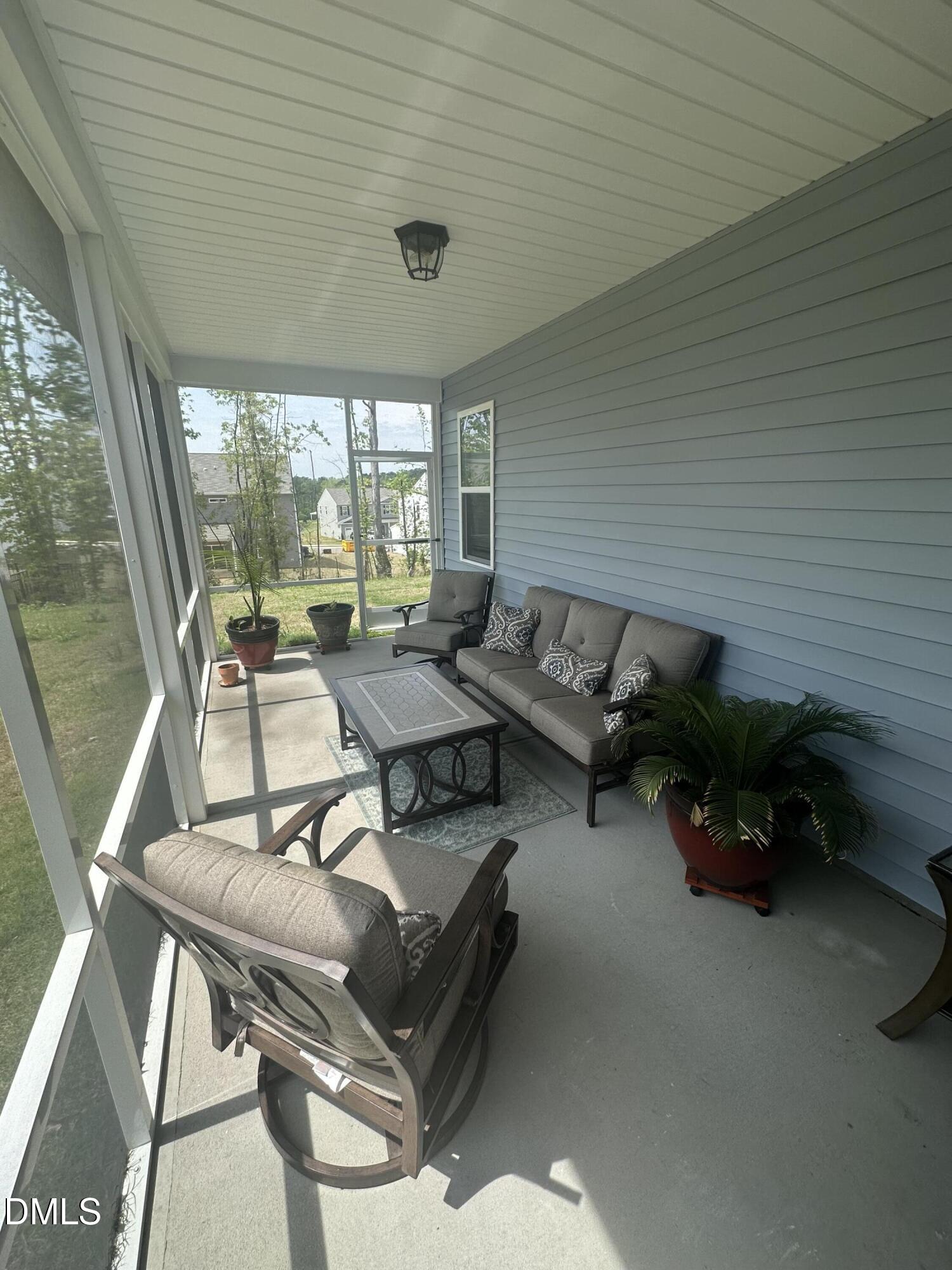 89 West Ravano Drive Clayton, NC 27527 - Photo 9 of 10 Screened Porch