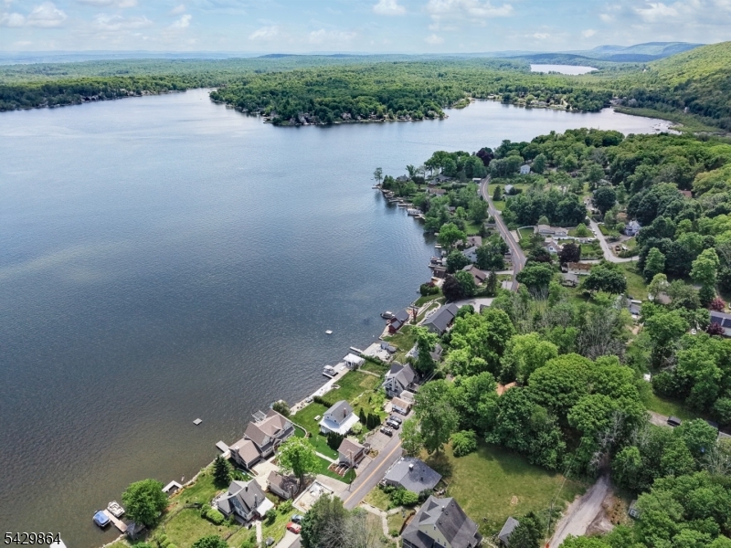77 Lower North Shore Road Branchville, NJ 07826 - Photo 38 of 38 a view of a lake with a yard