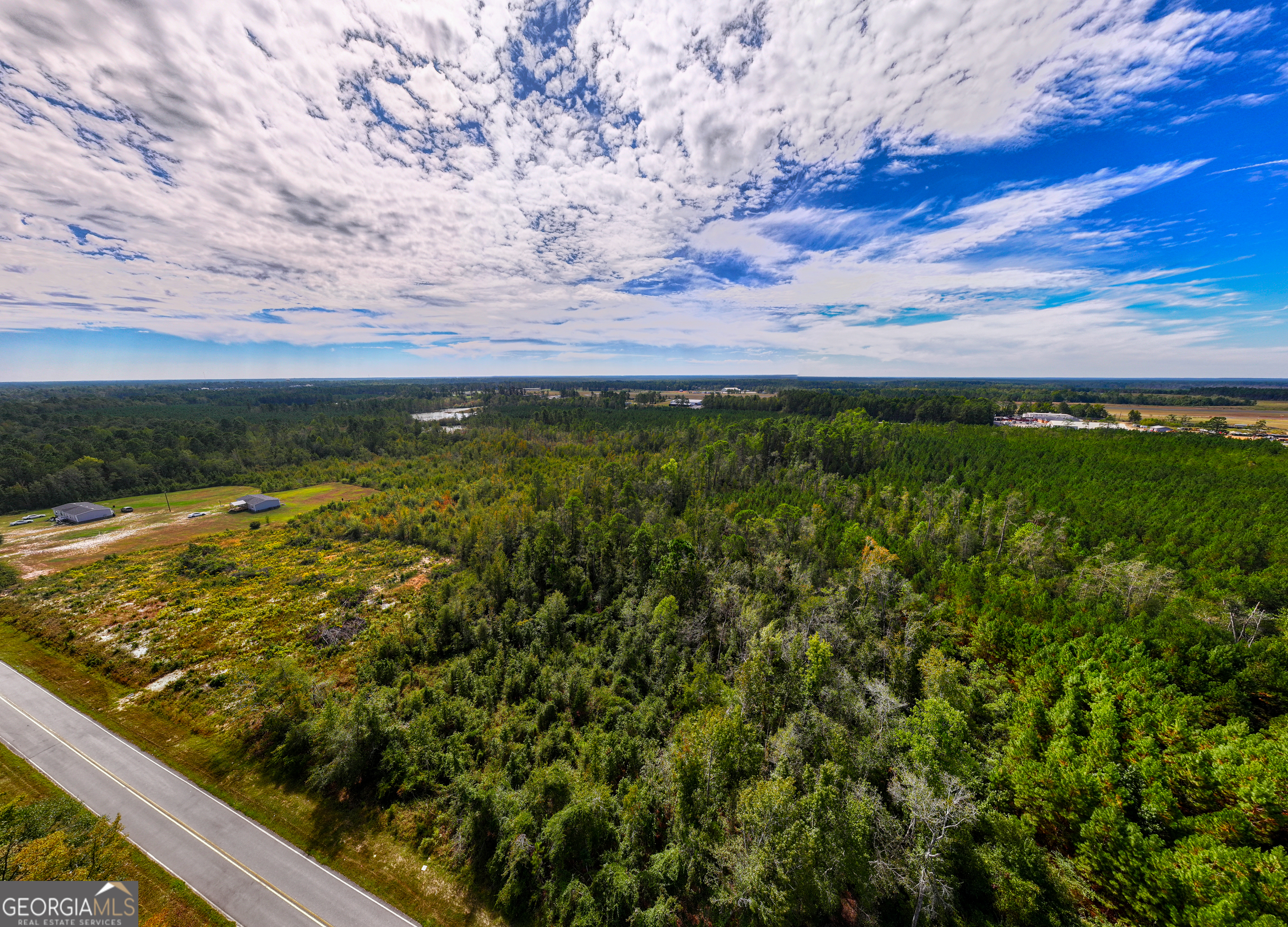 14.53-acres Gumlog Road Swainsboro, GA 30401 - Photo 6 of 7 a view of a yard with an outdoor seating