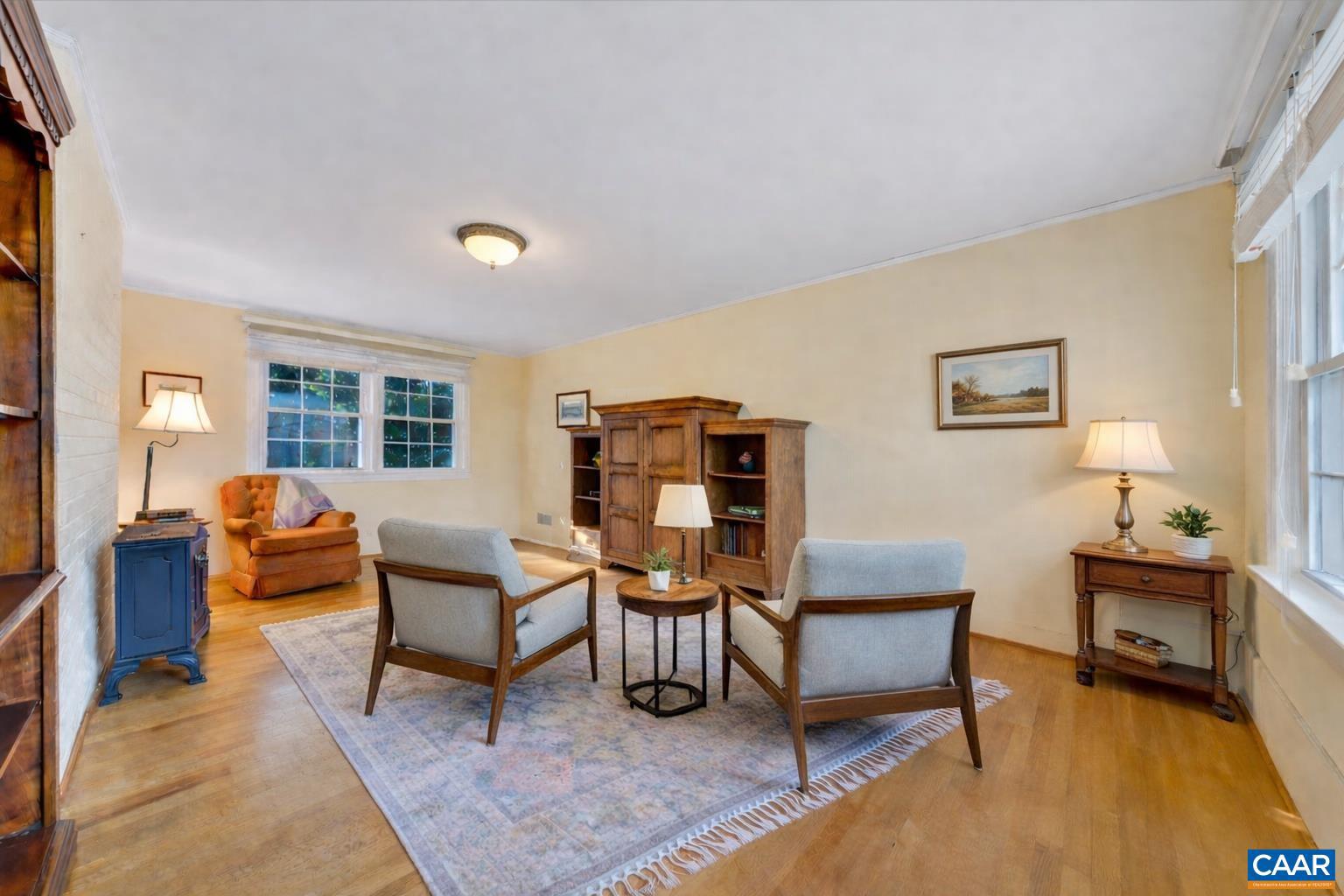 3558 Hartland Road Southwest Roanoke, VA 24015 - Photo 17 of 73 a living room with furniture and a table