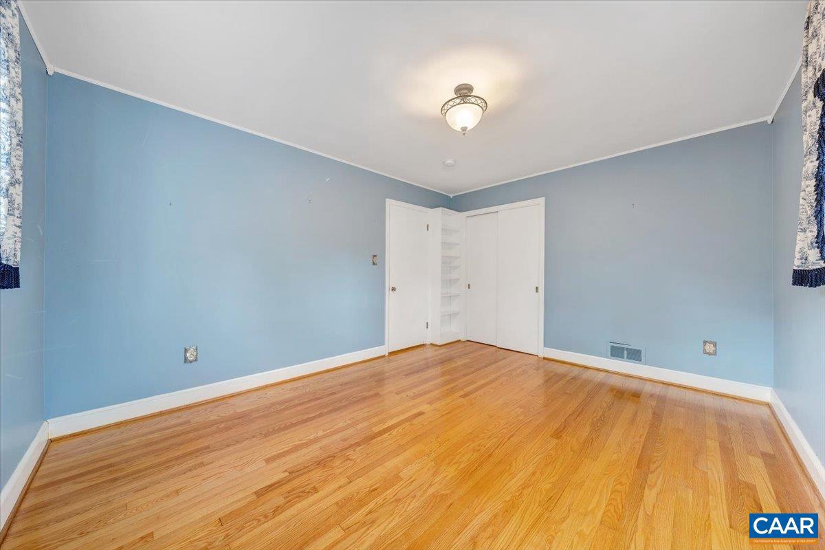 3558 Hartland Road Southwest Roanoke, VA 24015 - Photo 38 of 73 a view of empty room with wooden floor