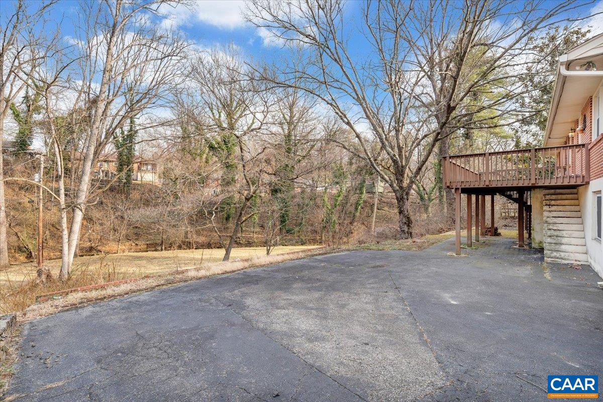 3558 Hartland Road Southwest Roanoke, VA 24015 - Photo 63 of 73 a view of a yard with a house and trees