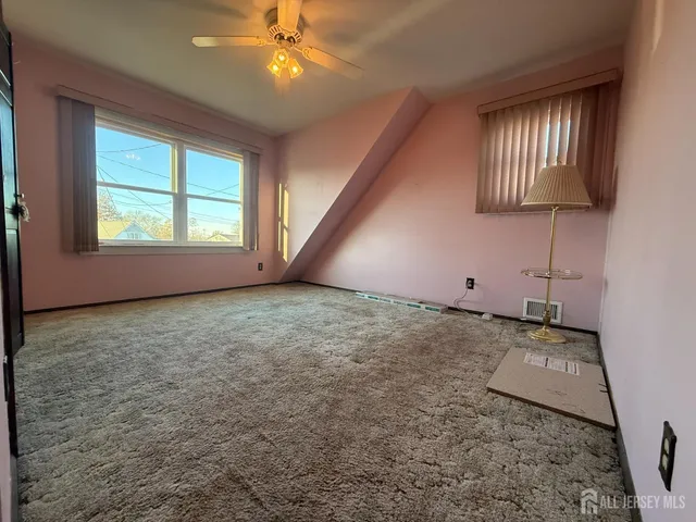 a view of an empty room with window