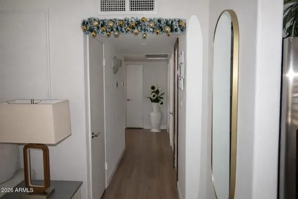 a view of a hallway with windows