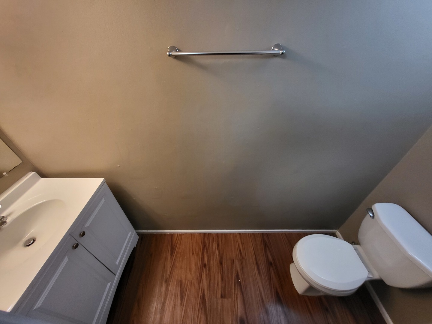 200 Rodenburg Road Roselle, IL 60172 - Photo 11 of 15 a bathroom with a toilet and a sink