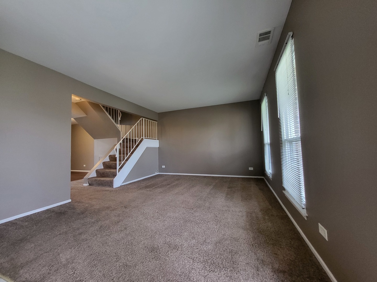 200 Rodenburg Road Roselle, IL 60172 - Photo 3 of 15 a view of an empty room with windows