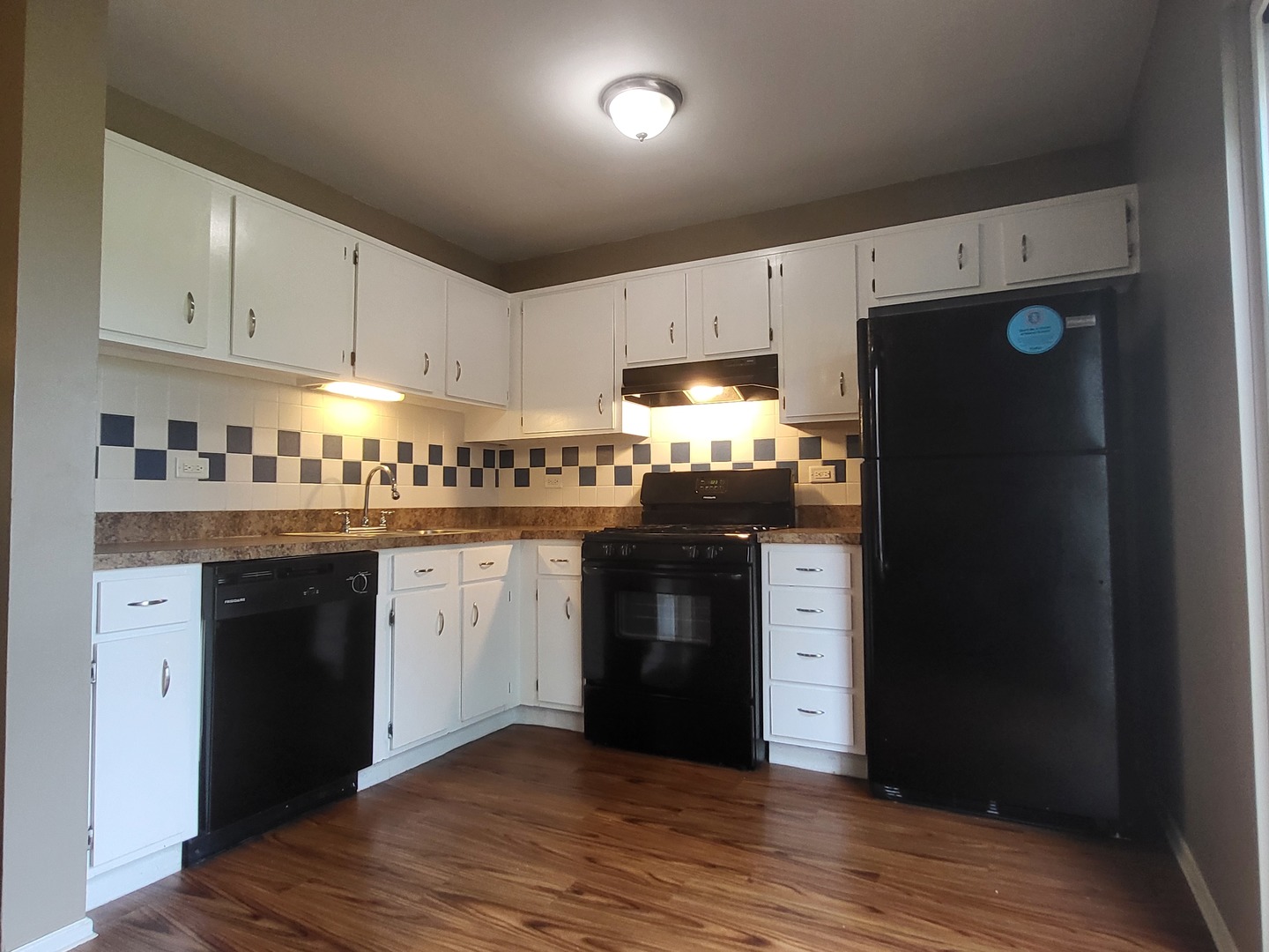 200 Rodenburg Road Roselle, IL 60172 - Photo 6 of 15 a kitchen with stainless steel appliances granite countertop a refrigerator and a stove