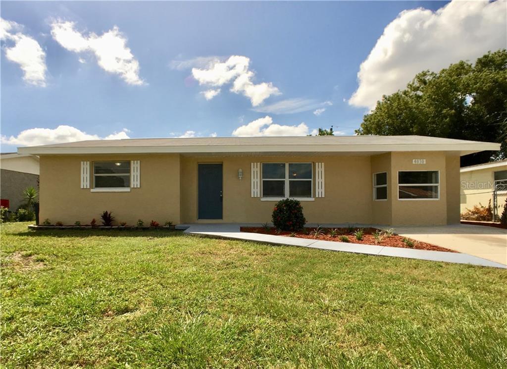 4030 Darlington Road Holiday, FL 34691 - Photo 1 of 1 New 30 Year Roof with 5 year workmanship warranty
