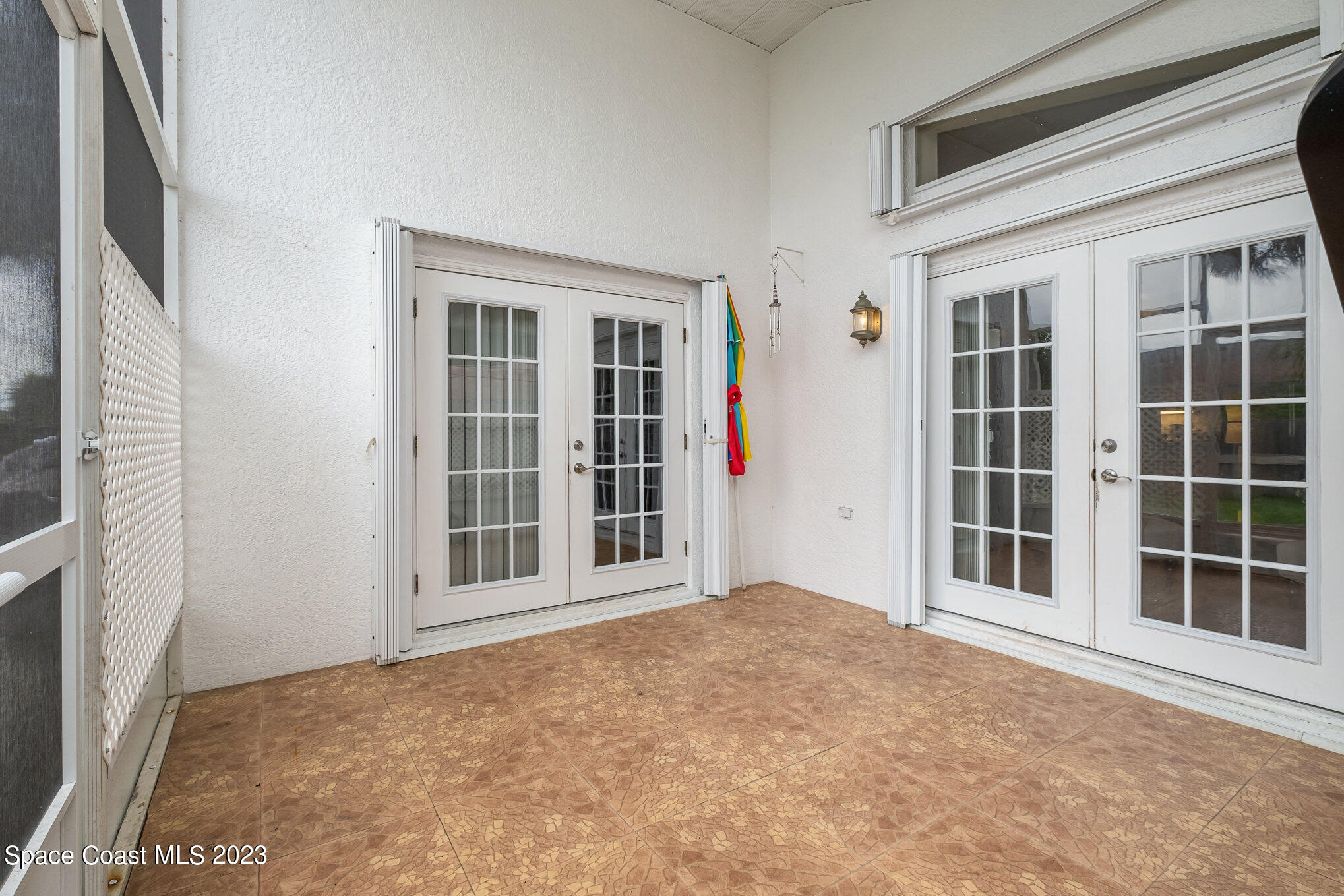 1698 Palm Ridge Road Melbourne, FL 32935 - Photo 19 of 24 Screen Porch
