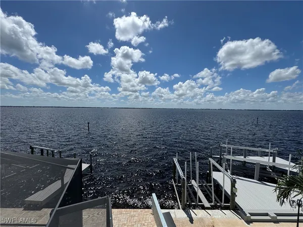 a view of a backyard of the kitchen