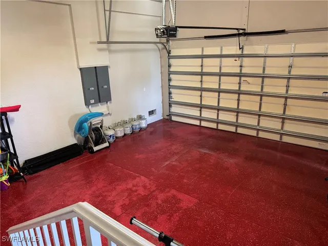 a view of a livingroom with furniture and staircase