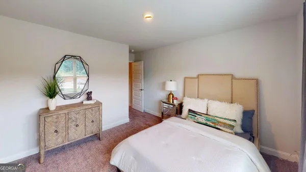 a bed room with a bed and a dresser