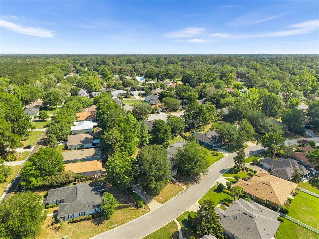7418 White Oaks Road Alachua, FL 32615 - Photo 45 of 46 an aerial view of residential houses with outdoor space