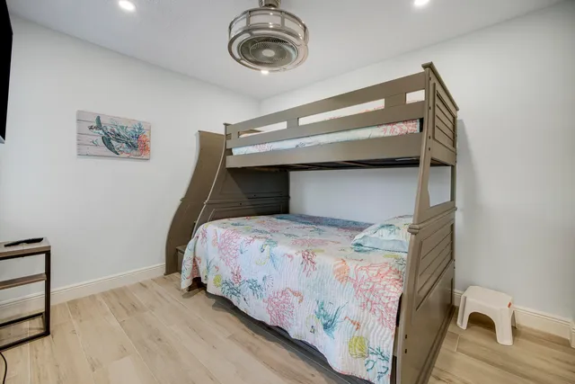 a kitchen with a stove and a refrigerator