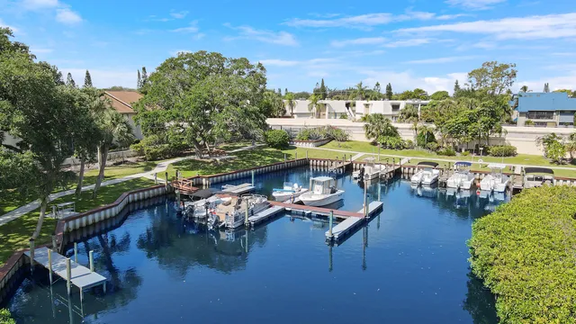 a view of a swimming pool and lounge chairs